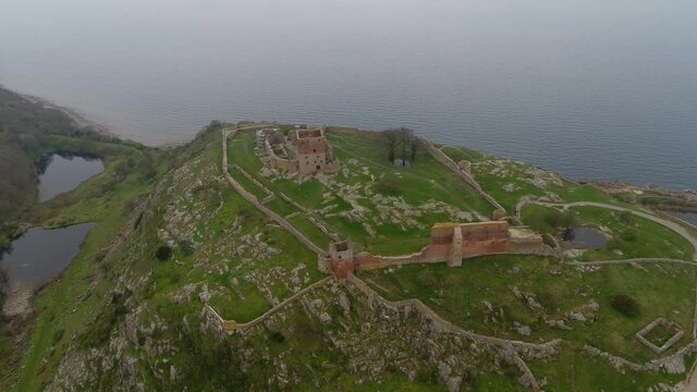 Aerial footage of the medieval castle ruin of Hammershus in Denmark, drone stock footage by DroneRune 3