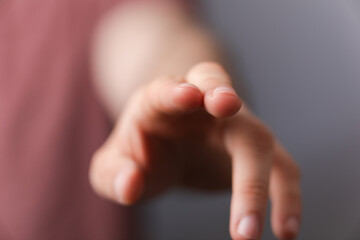 A man hand touching virtual screen, modern background concept , can put your text at the finger,...