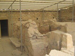 Archaeologist excavating on ancient ruins of Knossos palace.