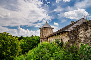 Fototapeta na wymiar A beautiful castle on a sunny day in the town of Otrokov..