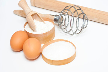 dough baking ingredients on white surface