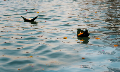 Burning Offering on the Water of the Ganges River in Varanasi, India.