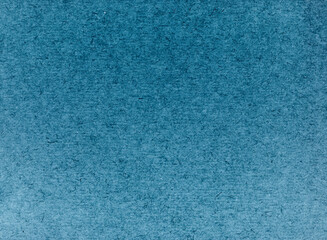 A dense industrial sheet of  paper with a textured surface