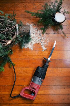 Trimming off the extra of the Christmas tree.