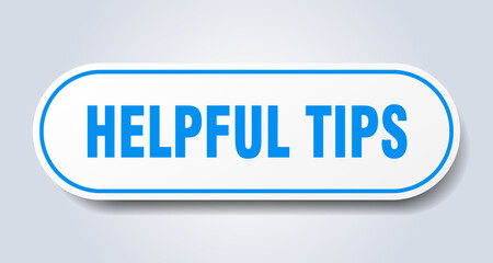 helpful tips sign. rounded isolated button. white sticker