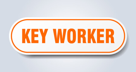 key worker sign. rounded isolated button. white sticker