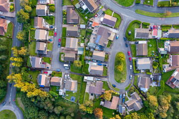 Top down aerial view of urban streets and cul de sacs in a quiet town