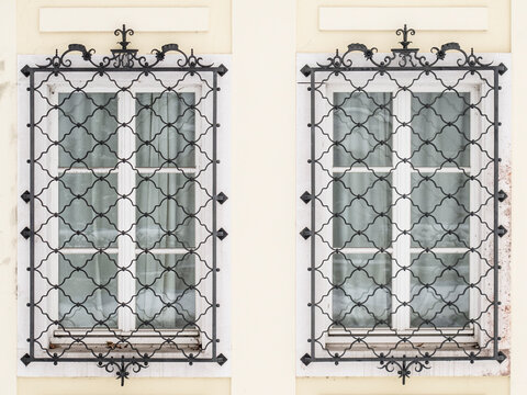 Two windows with baroque lattice screens