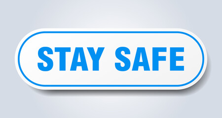 stay safe sign. rounded isolated button. white sticker