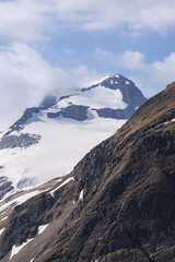 The "Punta d'arbola" with its glaciers, one of the most important peaks of the formazza valley, in the Alps, near the town of Riale, Italy - July 2020.