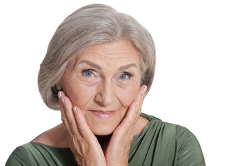 Close up portrait of emotional senior woman posing isolated