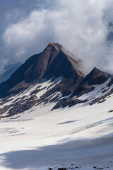 The glaciers, mountains and meadows of the alta val formazza at dawn, during a summer day, near the town of Riale, Italy - July 2020.