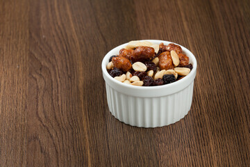 Healthy And Tasty Snack; Mixture of peanuts, raisins, and peanuts Covered With Honey.