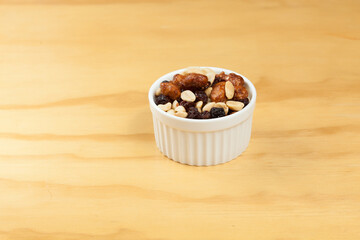 Healthy And Tasty Snack; Mixture of peanuts, raisins, and peanuts Covered With Honey.