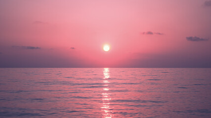 Fototapeta na wymiar Seascape, pink sunset. Horizontal background.