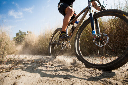 Mountain biking offroad.