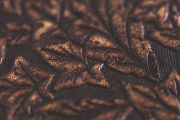 Macro Photograph Of Antique Embossed Leather