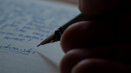 hand writing on a paper