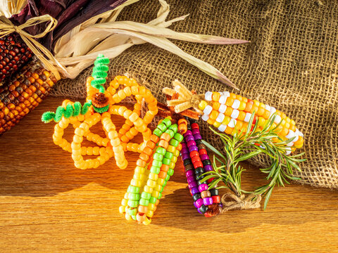 Indian corn and pumpkins made from pony beads