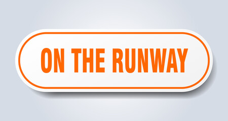 on the runway sign. rounded isolated button. white sticker