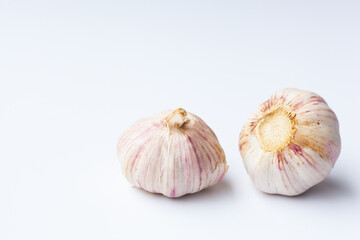 two head of garlic isolated on white background