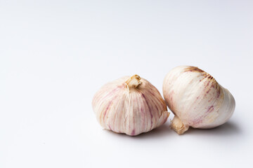 two head of garlic isolated on white background