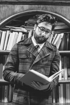 Young Male Bookworm Reading a Book