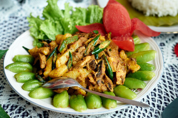 Smoked dry fish with spicy seasoning. Asian Traditional seafood menu