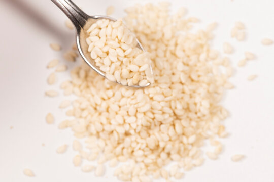Sesame Seeds isolated on white background. Macro