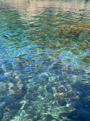 Crystal clear sea water surface. Turquoise calm Adriatic sea in Montenegro.