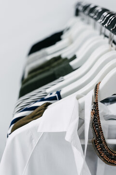 clothes on a rack in a shop