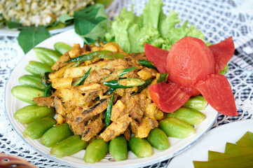 Smoked dry fish with spicy seasoning. Asian Traditional seafood menu