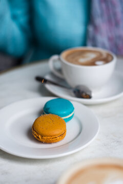 macarons and coffee. salted caramel, vanilla and whatever flavour you think could be blue