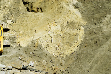 Earth moving of soil at the ground level of a construction project.