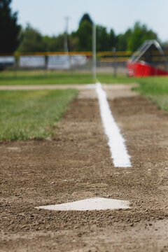 Home plate with newly chalked baseline in background