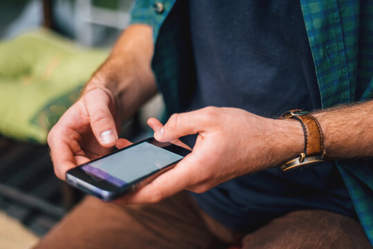 Caucasian man using his mobile phone