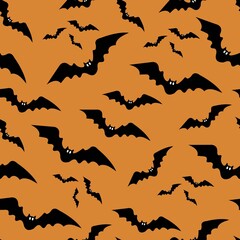 Orange seamless background with black bats. Background with bats. Halloween design element. Vector illustration.