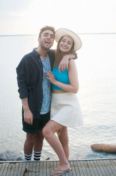 A young couple posing for a picture while on vacation