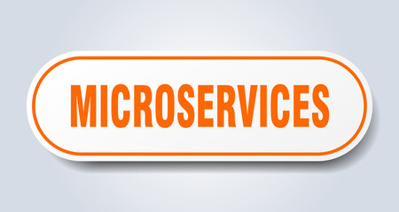 microservices sign. rounded isolated button. white sticker