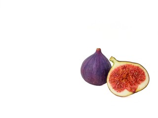 Bright juicy ripe figs on a white background.