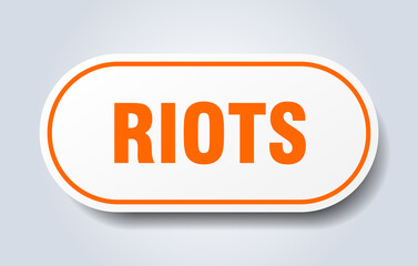 riots sign. rounded isolated button. white sticker