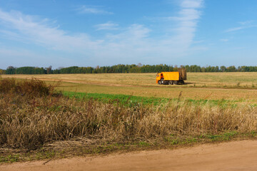 Fototapeta premium combine harvester working on a field