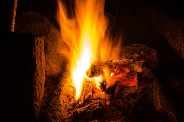 embers burn down in a hardwood fire