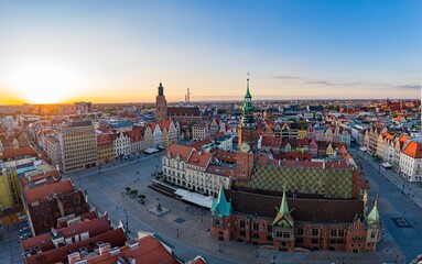 Obraz premium Aerial drone view on Wrocław old town and main square at sunset.
