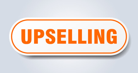 upselling sign. rounded isolated button. white sticker