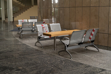 Seats marked as suitable to sit in public institution interior