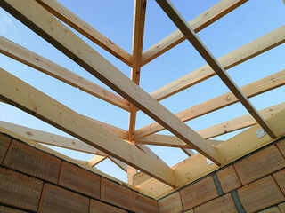 Wood girder beams for roof construction