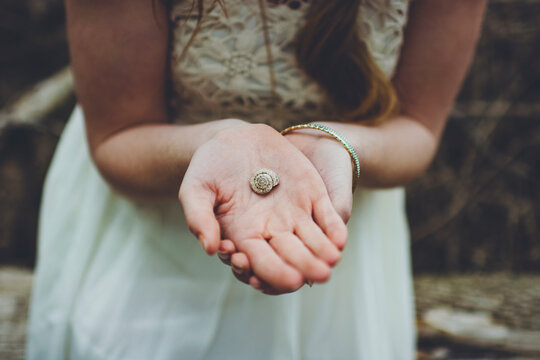 Girl Holding Shell