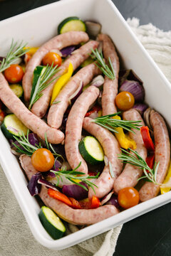 Uncooked Roasted vegetable and sausage dish