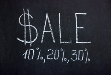 
Chalkboard inscription SALE with dollar sign and discount percentages 10,20,30